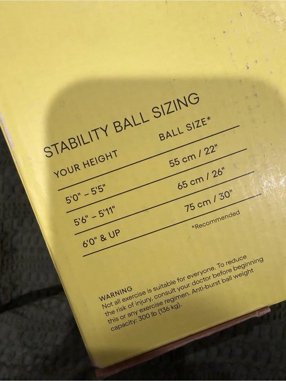 Target Yellow Box with Purple Exercise Ball Photo